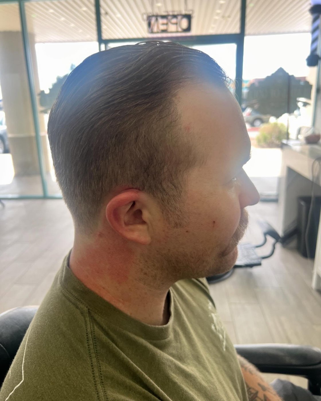 Short taper with a clean side profile — Blades of Gold Barbershop, Phoenix AZ
