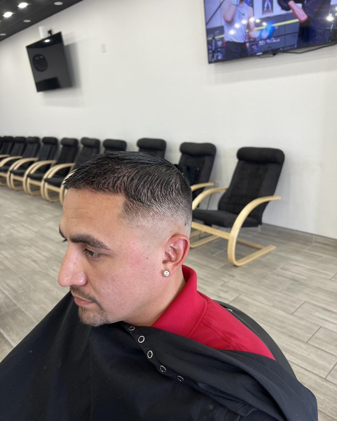 Side profile of a tapered cut with a crisp lineup — Blades of Gold Barbershop, Phoenix AZ